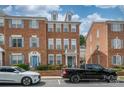 Attractive brick townhome featuring a charming entrance and classic architectural design at 11123 Waxberry Dr, Charlotte, NC 29277