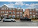 Beautiful brick townhomes showcasing appealing facades and well-kept surroundings at 11123 Waxberry Dr, Charlotte, NC 29277