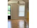 Bright living room featuring beautiful hardwood floors, and large windows at 1721 9Th Ne Ave, Hickory, NC 28601