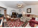 Well-decorated living room with fireplace, plush seating, and ample space at 9337 Four Mile Creek Rd # 101, Charlotte, NC 28277