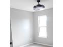 Cozy bedroom with natural light, neutral walls and light-colored wood-look floors at 10615 Elm Bend Dr, Charlotte, NC 28273