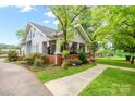 Beautiful home with well-maintained landscaping and inviting curb appeal at 153 S Center St, Taylorsville, NC 28681