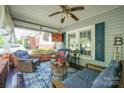 Relaxing front porch with comfortable seating and charming decor elements at 153 S Center St, Taylorsville, NC 28681