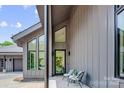 Inviting front porch with seating, showcasing the modern exterior and entrance at 3304 Mar Vista Cir, Charlotte, NC 28209