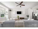 Cozy living room with large window and neutral decor for a relaxing ambiance at 5008 Patton Dr, Gastonia, NC 28056