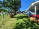 Spacious backyard with a view of a shed and an iron fence at 903 Woodside Dr, Kings Mountain, NC 28086