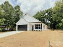 Beautiful single-Gathering home with manicured lawn and classic architectural design at 118 3Rd Nw Ave, Conover, NC 28613