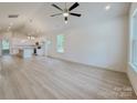 Spacious living room featuring modern flooring, recessed lighting, and a ceiling fan at 118 3Rd Nw Ave, Conover, NC 28613