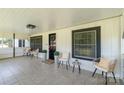 Inviting front porch features stylish seating, decor, and a welcoming entrance at 1909 Mountain Springs Church Rd, Monroe, NC 28112