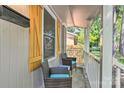 Inviting front porch with seating area, perfect for relaxing and enjoying the outdoors at 3020 Stancill Pl, Charlotte, NC 28205