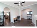 Open concept living space boasts hardwood floors, arched entryways, and great flow at 334 Kennerly Center Dr, Mooresville, NC 28115