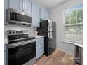 Modern kitchen showcasing stainless steel appliances and sleek cabinetry, providing a stylish cooking space at 4607 Silk Tree Ln, Rock Hill, SC 29732