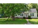 Quaint home featuring a well-maintained lawn and mature trees providing shade and curb appeal at 514 Saluda Rd, Chester, SC 29706