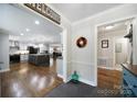 Open-concept living space flows seamlessly into a modern kitchen with a granite island at 926 Meadow Lakes Rd, Rock Hill, SC 29732