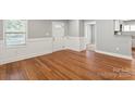 Bright open space boasts hardwood flooring and fresh paint at 113 W 5Th Ave, Gastonia, NC 28052