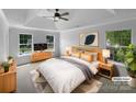 Serene main bedroom features a tray ceiling, two windows, and neutral decor for a relaxing retreat at 1523 Merrie Meadow Ct, Rock Hill, SC 29732
