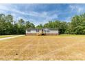 Inviting single-Gathering home with an expansive lawn and new wood porch at 2007 Sugar Hill Rd, York, SC 29745