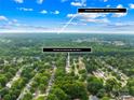 Aerial view of the home showing the neighborhood and the close proximity to Downtown Mooresville at 256 Rose St, Mooresville, NC 28117