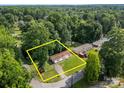 Aerial view of the home and property surrounded by lush trees at 1011 Rachel Ln, Salisbury, NC 28147
