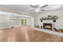 Spacious living room showcasing the fireplace, hardwood floors, and open layout at 2229 Old Wilkesboro Rd, Statesville, NC 28625