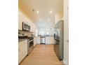 Spacious kitchen boasts stainless steel appliances, granite countertops, and ample cabinet space at 2921 Parkwest Dr, Albemarle, NC 28001