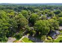 Lush, green neighborhood with mature trees and well-maintained homes at 5329 Valley Forge Rd, Charlotte, NC 28210