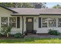 Charming home with an inviting front door, black shutters, and well-maintained landscaping at 5329 Valley Forge Rd, Charlotte, NC 28210