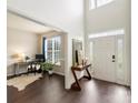 Welcoming foyer featuring dark hardwood floors and bright, neutral paint at 11332 Anna Rose Rd, Charlotte, NC 28273