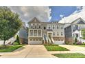 Attractive townhomes with colorful doors, attached garages, and inviting curb appeal at 402 Belton St, Charlotte, NC 28209