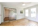 Cozy sun room with wood floor and multiple windows at 4308 Pinto Ln, Gastonia, NC 28052