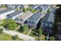Aerial view of a neighborhood featuring well-maintained homes with lush greenery and sidewalks at 11965 Hambright Rd, Huntersville, NC 28078