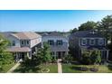 Beautiful two-story home featuring well-maintained landscaping and a welcoming front porch at 11965 Hambright Rd, Huntersville, NC 28078