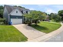 Attractive home showing the driveway, attached garage, and well-maintained lawn at 162 Castles Gate Dr, Mooresville, NC 28117