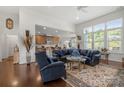 Bright living room with hardwood floors and an open concept layout with lots of natural light at 2399 Ashbourne Se Pl, Concord, NC 28025