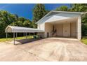 Spacious carport offers covered parking and convenient access to the home, featuring a full walk-up basement at 4330 Rowell Rd, Lancaster, SC 29720