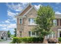 Charming home with brick exterior, well-maintained landscaping, and a welcoming facade at 9001 Lanark Ln, Fort Mill, SC 29707