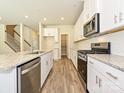 Modern kitchen featuring stainless steel appliances, granite countertops, and a pantry at 1117 Morehead Dr, Salisbury, NC 28144
