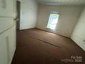 Bedroom with neutral walls and carpet, needing some TLC and imagination at 0 Woodleaf Rd, Salisbury, NC 28147