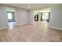 Bright living area with resilient floors, connecting seamlessly to the kitchen at 1020 N Ransom St, Gastonia, NC 28052