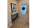Stylish entryway featuring a console table, decorative mirror, and modern accents at 410 Apex Cir, Shelby, NC 28152