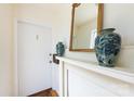 Bright hallway with elegant decor and decorative vases at 528 Wakefield Dr # A, Charlotte, NC 28209