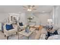 Cozy living room showcasing modern furniture, accent pillows, and a stylish rug at 203 Putnam St, Shelby, NC 28152