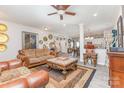 Comfortable living room showcasing unique furniture and decor, seamlessly connected to the dining area at 1117 Laurel Woods Dr, Gastonia, NC 28052