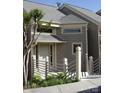 Charming condo featuring neutral siding, architectural windows, and updated railings at 14529 Waterside Dr, Charlotte, NC 28278