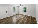 Cozy bedroom with wood-look flooring, bright windows, and neutral decor to allow personalization at 232 Branchwood Cir, Kings Mountain, NC 28086