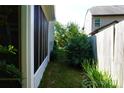Side yard with privacy fence and lush greenery at 4003 Northerly Island Ct, Gastonia, NC 28056
