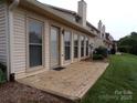 Backyard with a stone tiled patio for outdoor relaxation and enjoyment at 833 21St Ne Ave # 833, Hickory, NC 28301