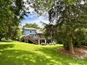 Expansive backyard featuring a large deck, perfect for outdoor entertaining and relaxation at 106 Boyter Ct, Cramerton, NC 28032