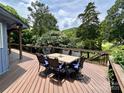 Large deck with outdoor dining, perfect for enjoying scenic views at 106 Boyter Ct, Cramerton, NC 28032
