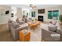 Inviting living room with fireplace, large windows, and stylish decor, perfect for relaxation at 2027 Brook View Ct, Matthews, NC 28104